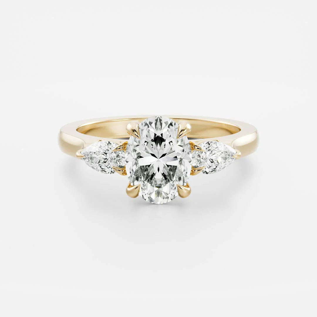 3.00 Carat Oval and Pear Cut Trilogy Engagement Ring in 18ct Yellow Gold
